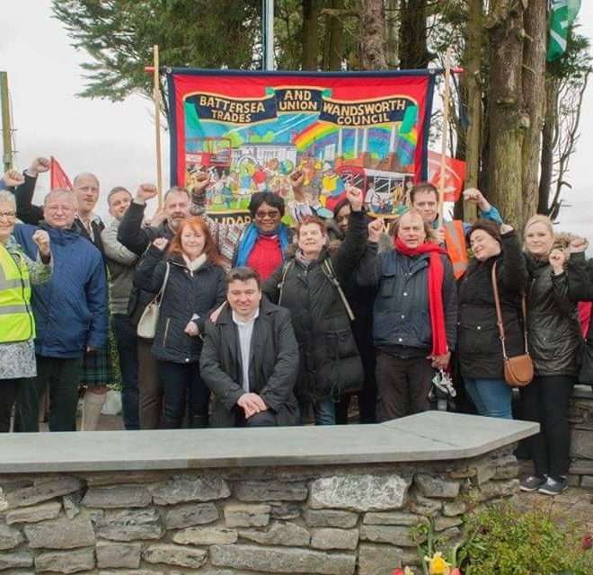 GMB union march with banner and flags
