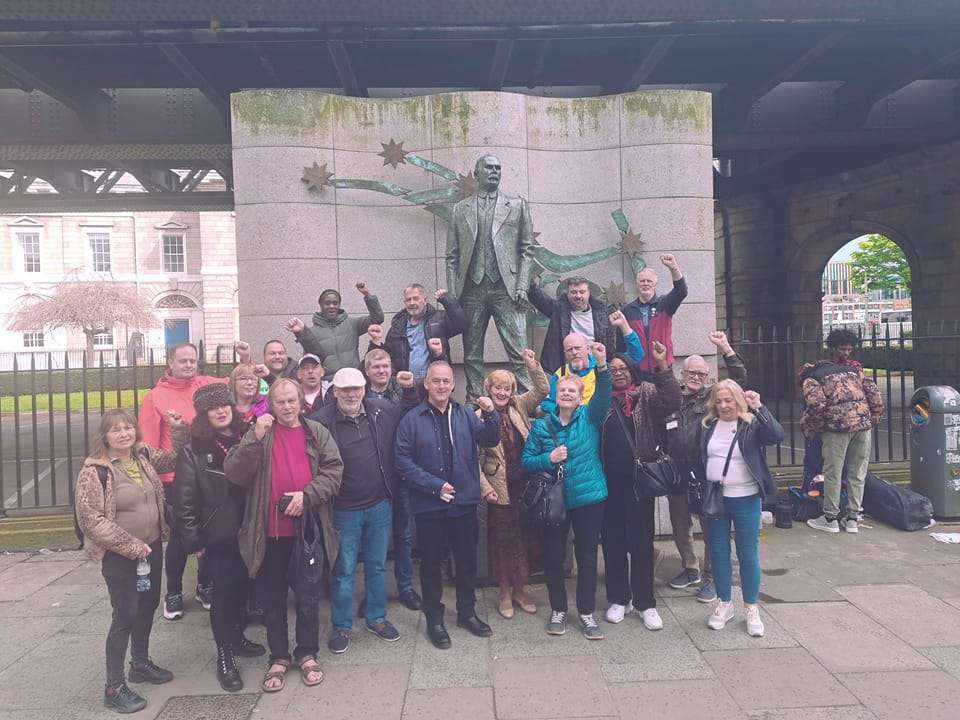 GMB union march with banner and flags