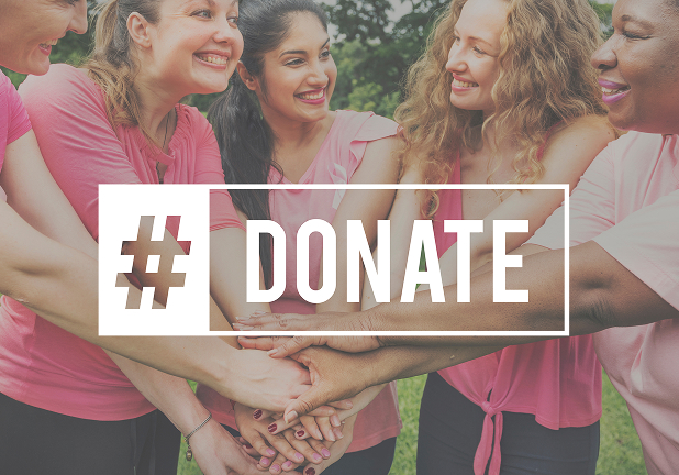 Group of people putting hands together with a hashtag donate graphic
